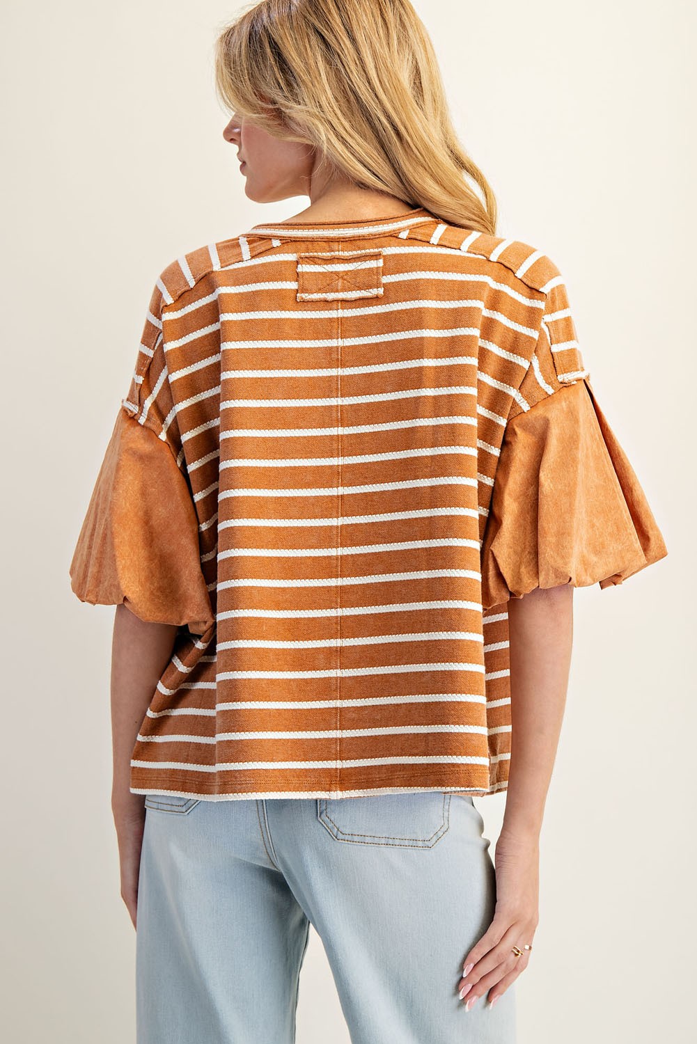 Cinnamon Striped Puff Sleeve Top in brown and white stripes, wide contrast puff sleeves. Available in sizes XS–XL.