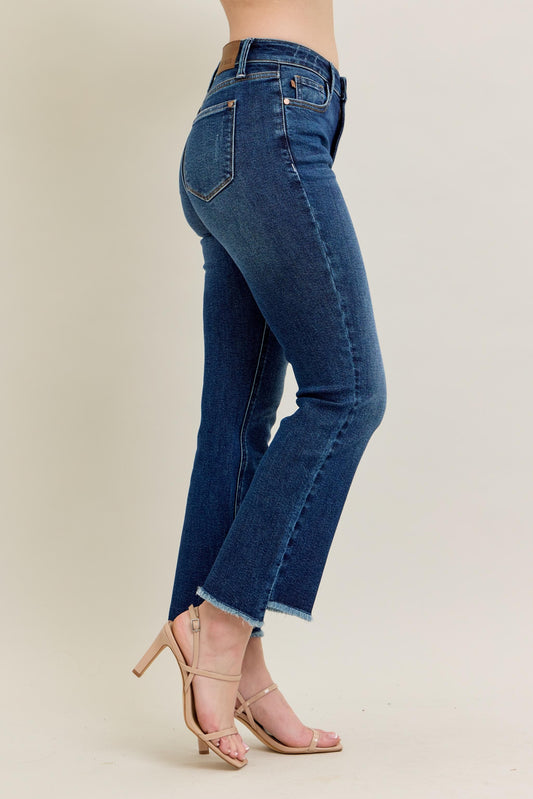 Judy Blue HW Dark Wash Kick Flare Jeans with raw hem. Available in sizes 0-24.