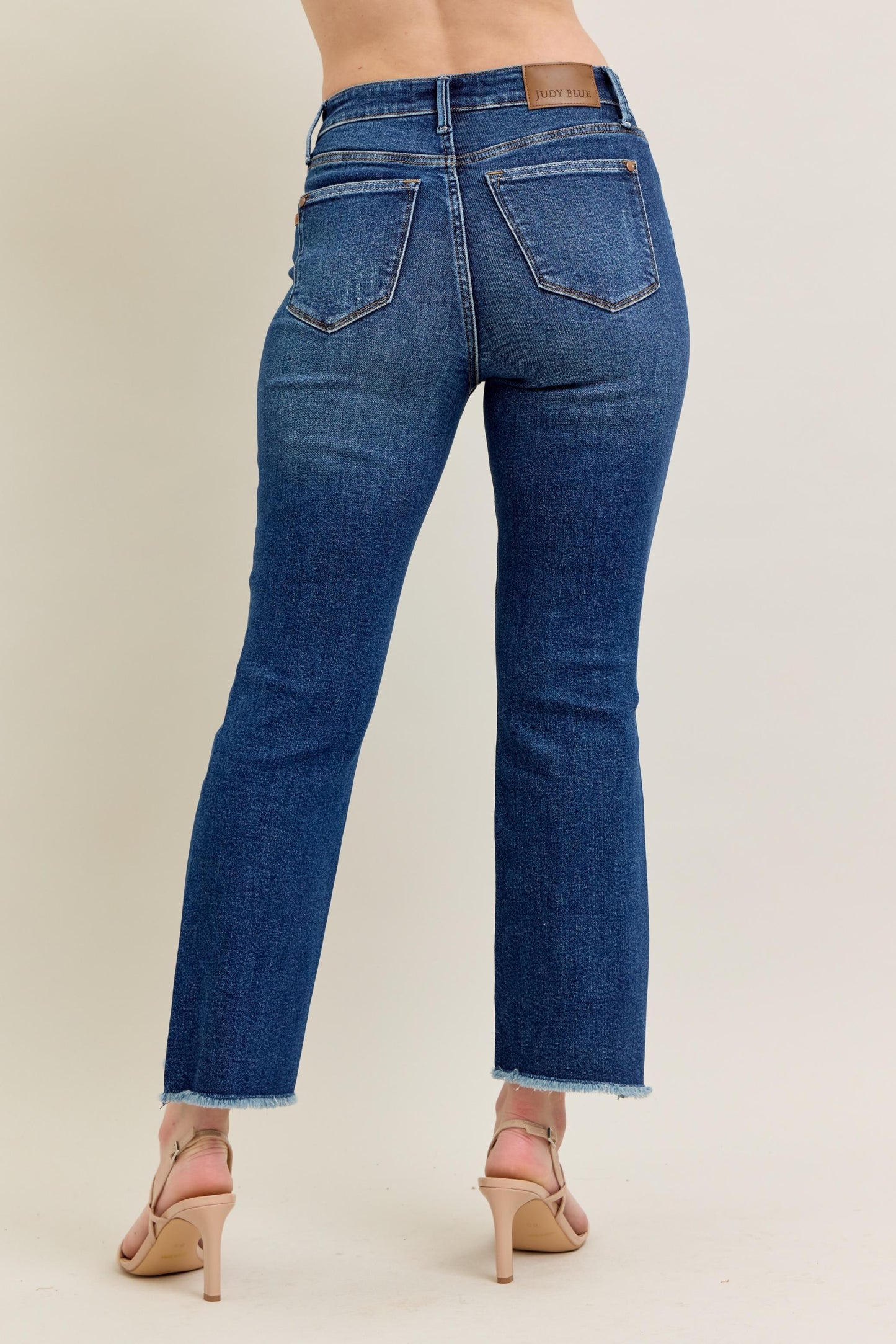 Judy Blue HW Dark Wash Kick Flare Jeans with slight flare and frayed hems. Available in sizes 0-24W.