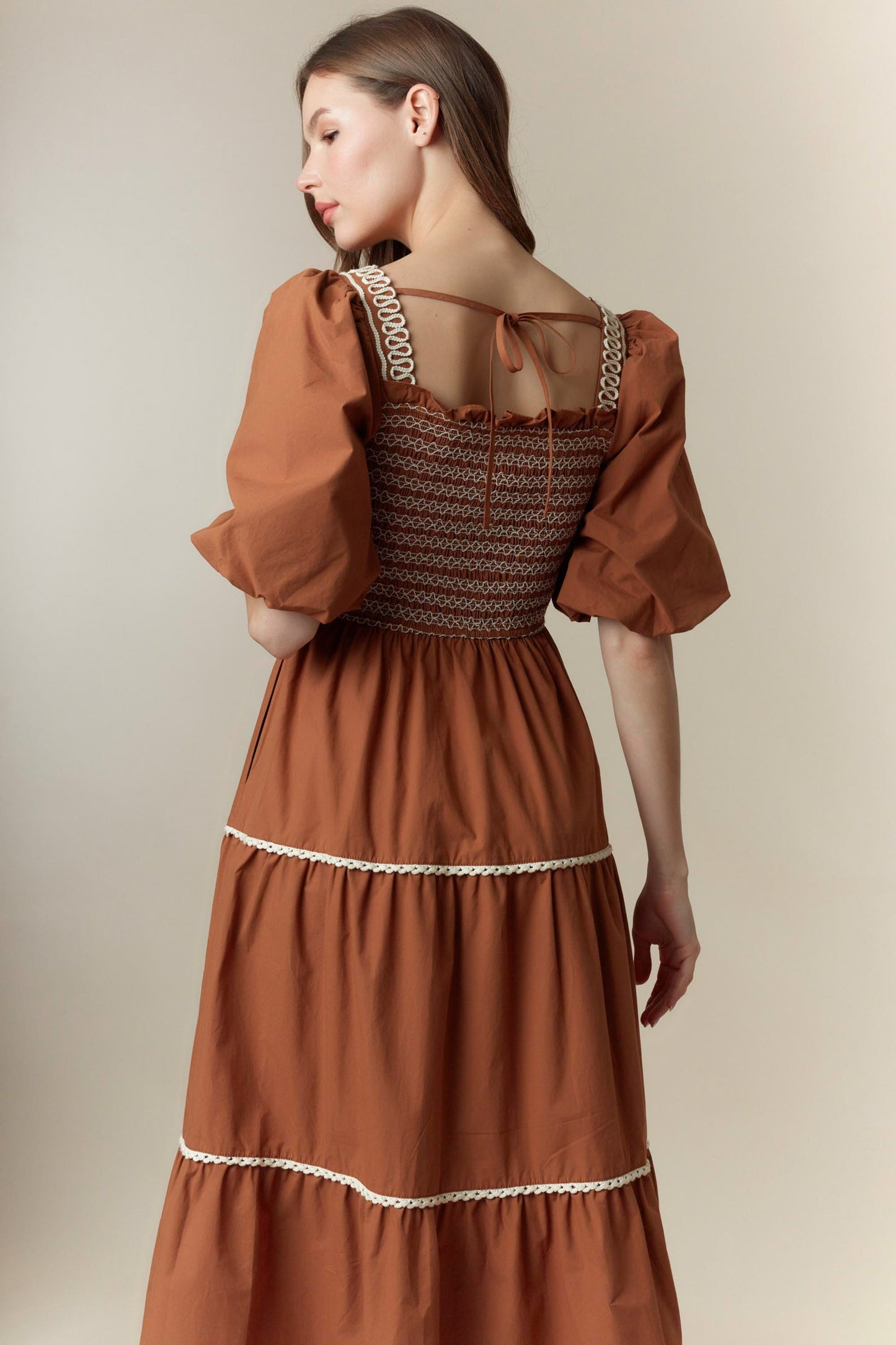 Pumpkin Patch Smocked Bubble Sleeve Maxi Dress in rust with puff sleeves, white lace trim, smocked back; sizes XS-XL.