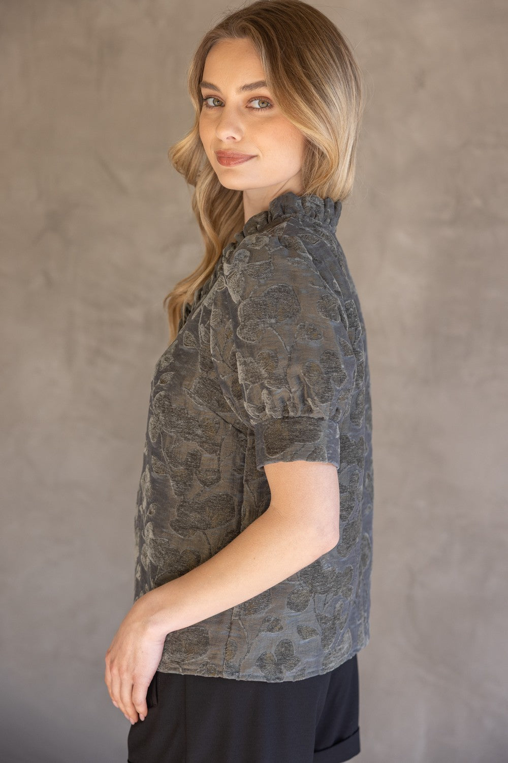 Charcoal Ruffled V-Neck Textured Velvet Top, available in sizes S-XL.