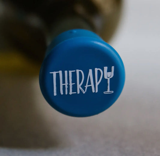 Blue Wine Cap with "THERAPY" text, wine glass-shaped "Y"; reseals bottles. Available in standard and large sizes.