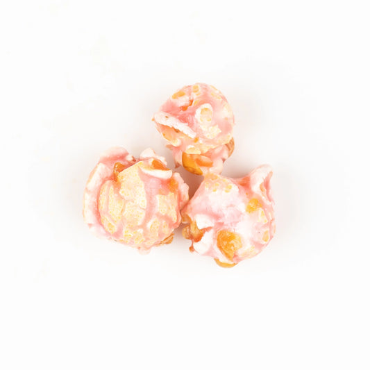 Valentine's Day Cotton Candy Poppy Popcorn features pink kernels with a nostalgic glaze. Available sizes: Small, Medium, Large.
