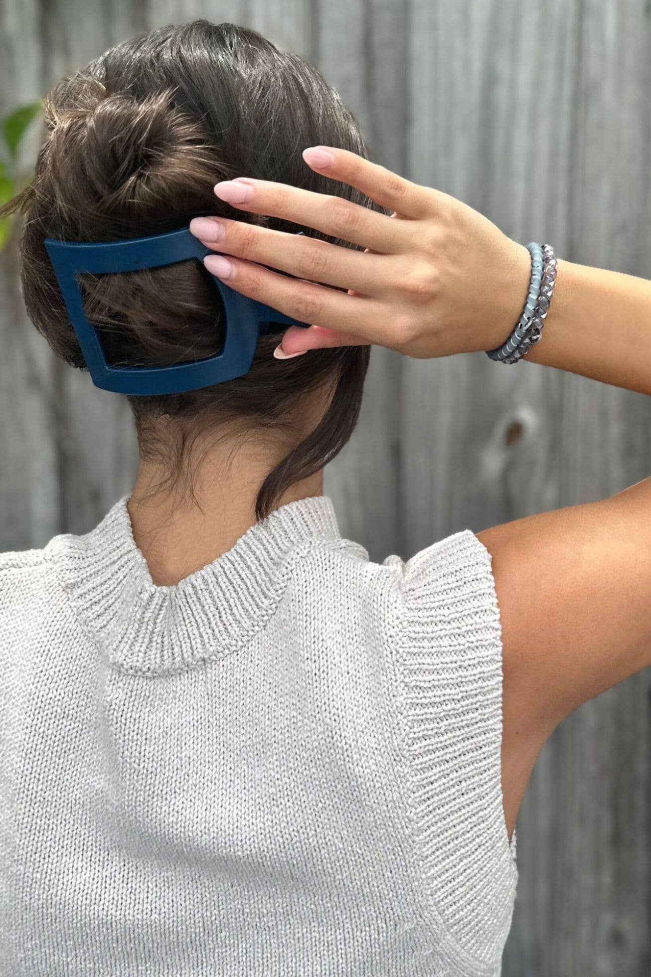TELETIES Square Flat Hair Clip in dark blue; secures hair and adds style. Available sizes: small, large.
