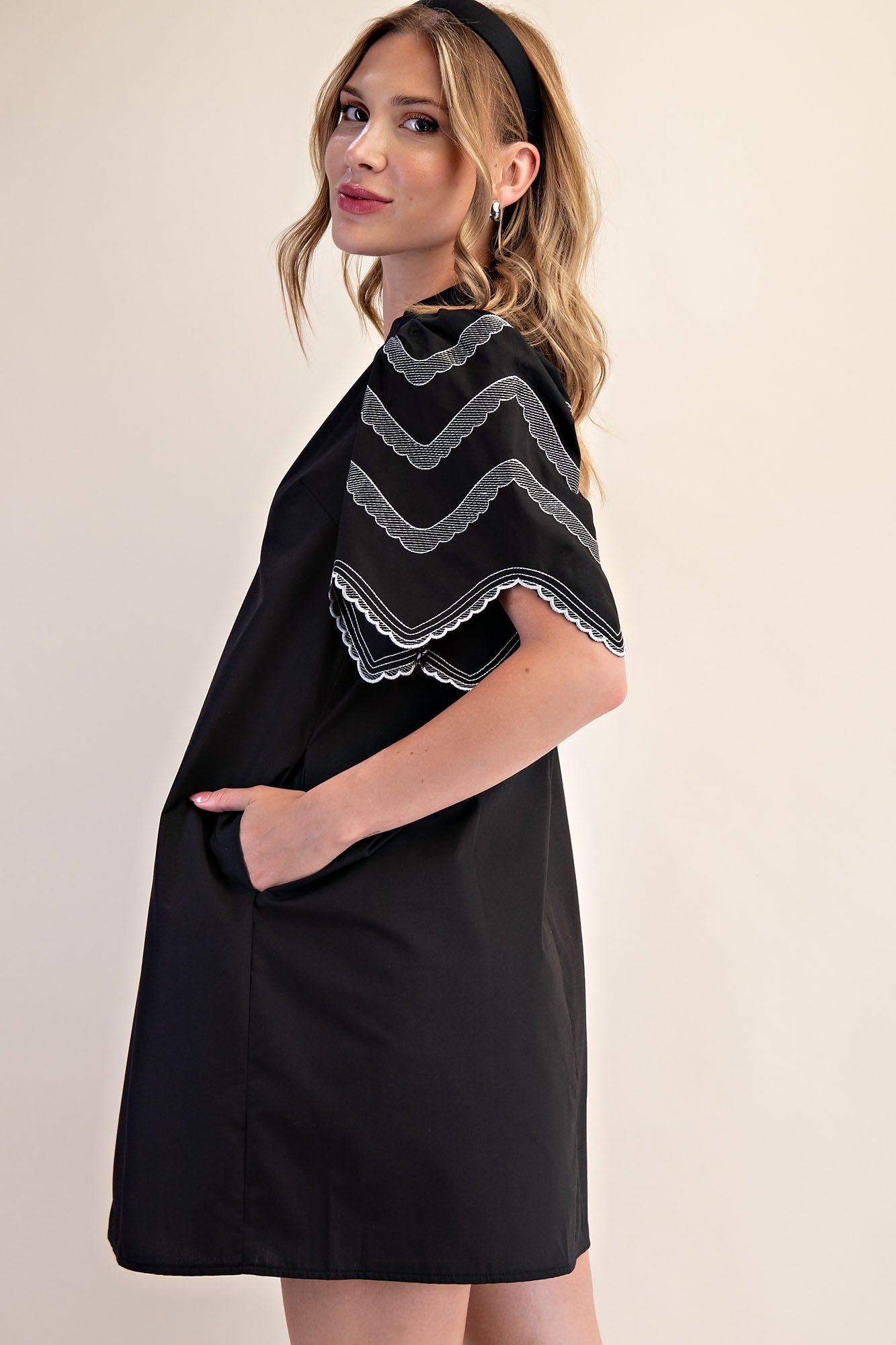 Heidi Balloon Sleeve Dress: short, scalloped sleeves, white zigzag trim. Available in sizes XS-XL.