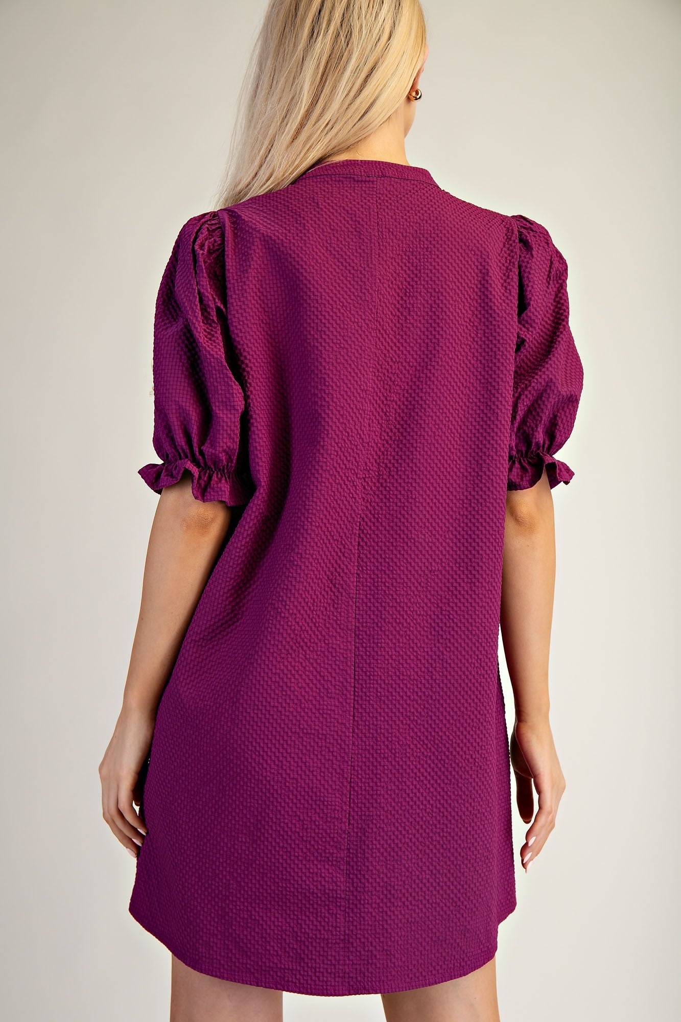 Lyla Puff Sleeve Dress in magenta, textured fabric, short puff sleeves. Available in sizes XS–XL.