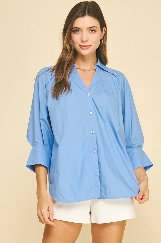 French Blue V-Neck Collar Wide Cuff Shirt: loose, 100% cotton, light blue, wide three-quarter sleeves. Sizes XS–XL.