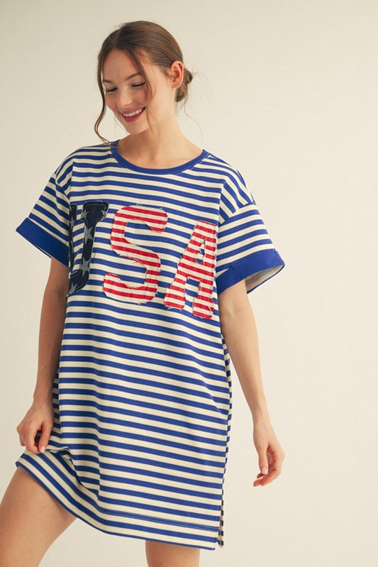 USA Striped Dress with blue and white stripes, "USA" appliqué. Available in sizes S-XL.
