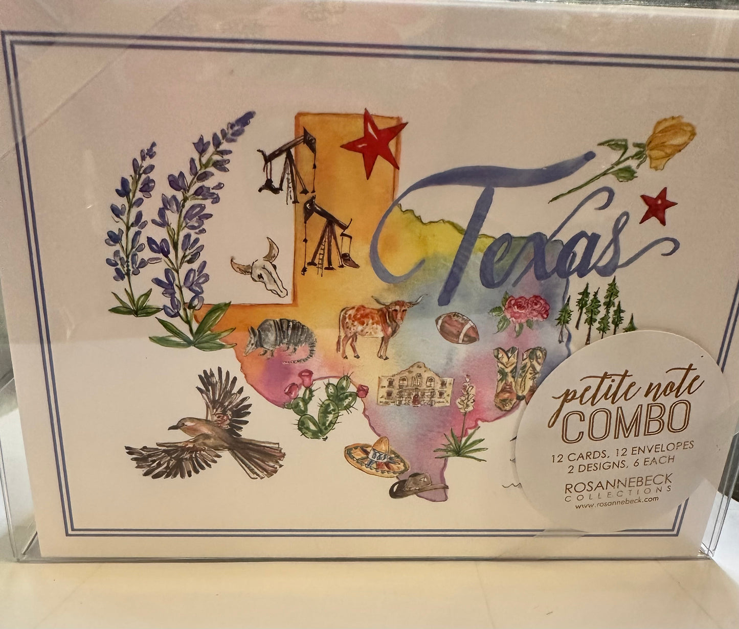 Decorative stationery set with hand-painted Texas map, symbols, and color envelopes. Sizes: standard note.