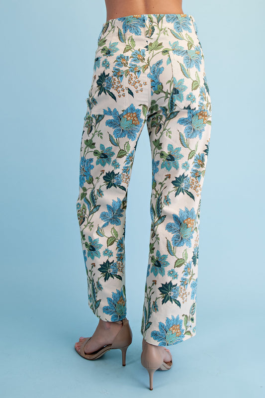 Blue Floral Ankle Cropped Pants with blue and green floral pattern. Available in sizes XS-XL.