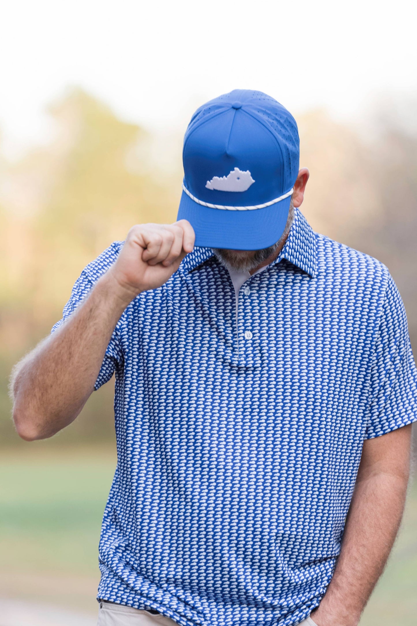 Lexington Blue and White State Performance Polo, available in sizes S-XXL.