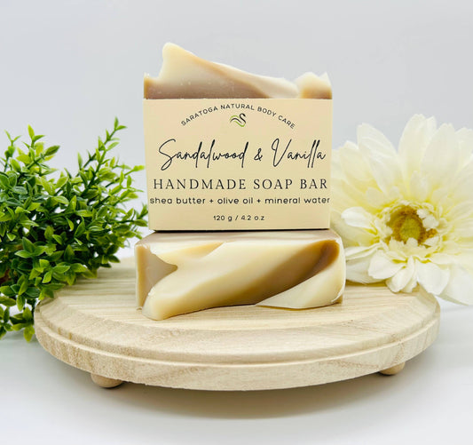 Saratoga natural body care, handmade soap bar 4.2 ounces it has Shea butter, olive oil, and mineral water. It’s fragrance is sandalwood and vanilla, moisturizing, nursing and gentle cream with brown swirls.