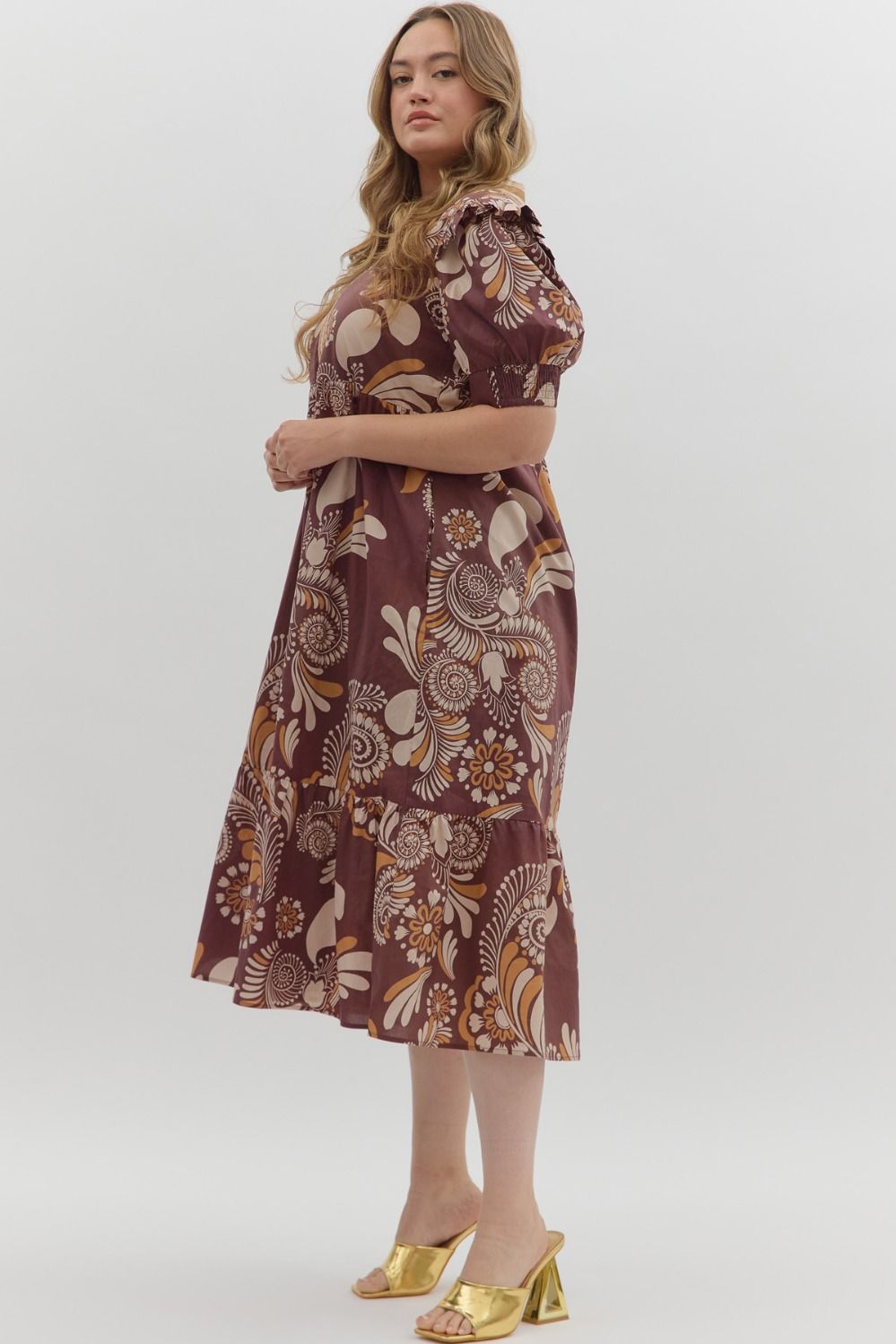 Betty Floral Dress: maroon, ruffled sleeves and hem. Available in sizes XS–XL.