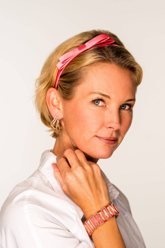 Sloane Mini Bow Headband shown; available in small, medium, and large sizes.