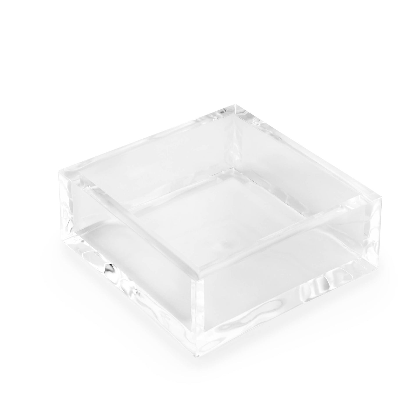Transparent square Deluxe Napkin Holder, 5x5 inches. Crafted from glass or acrylic with raised edges. Clear, smooth surface. Solid and sturdy, ideal for holding square cocktail napkins elegantly.