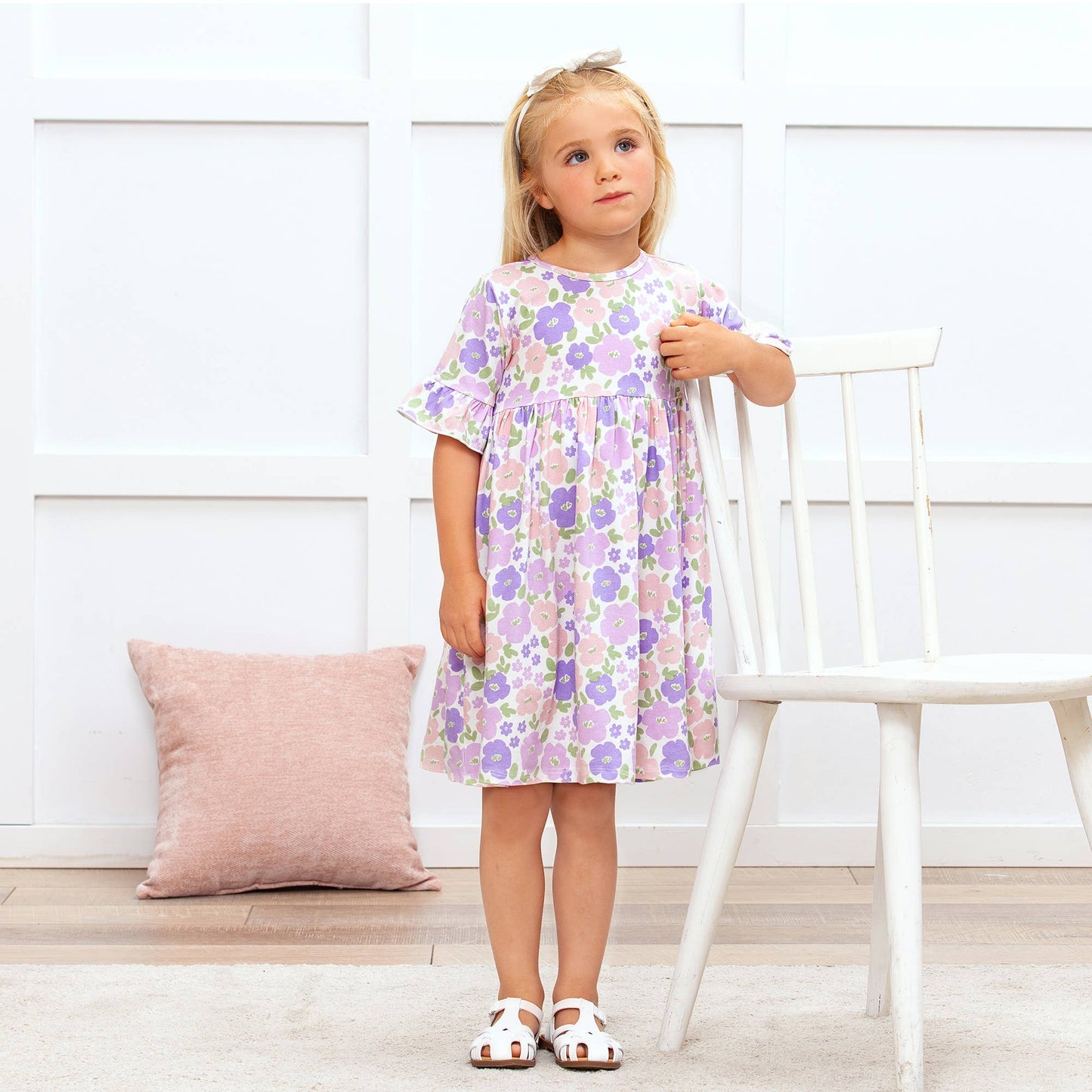 Floral Frolic Bamboo Dress, available in sizes 2T-6T, features a floral print and soft bamboo fabric.