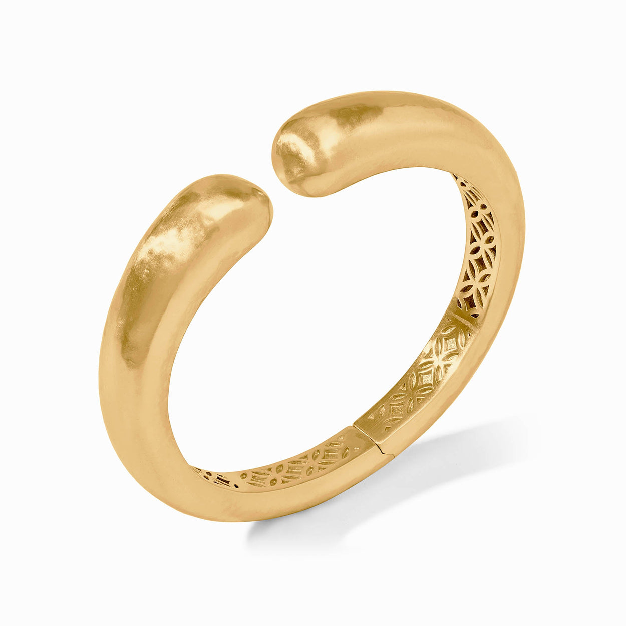 Solara Demi Cuff: open-ended 24K gold-plated bracelet with rounded tips, geometric pattern inside. Available in S/M, M/L.