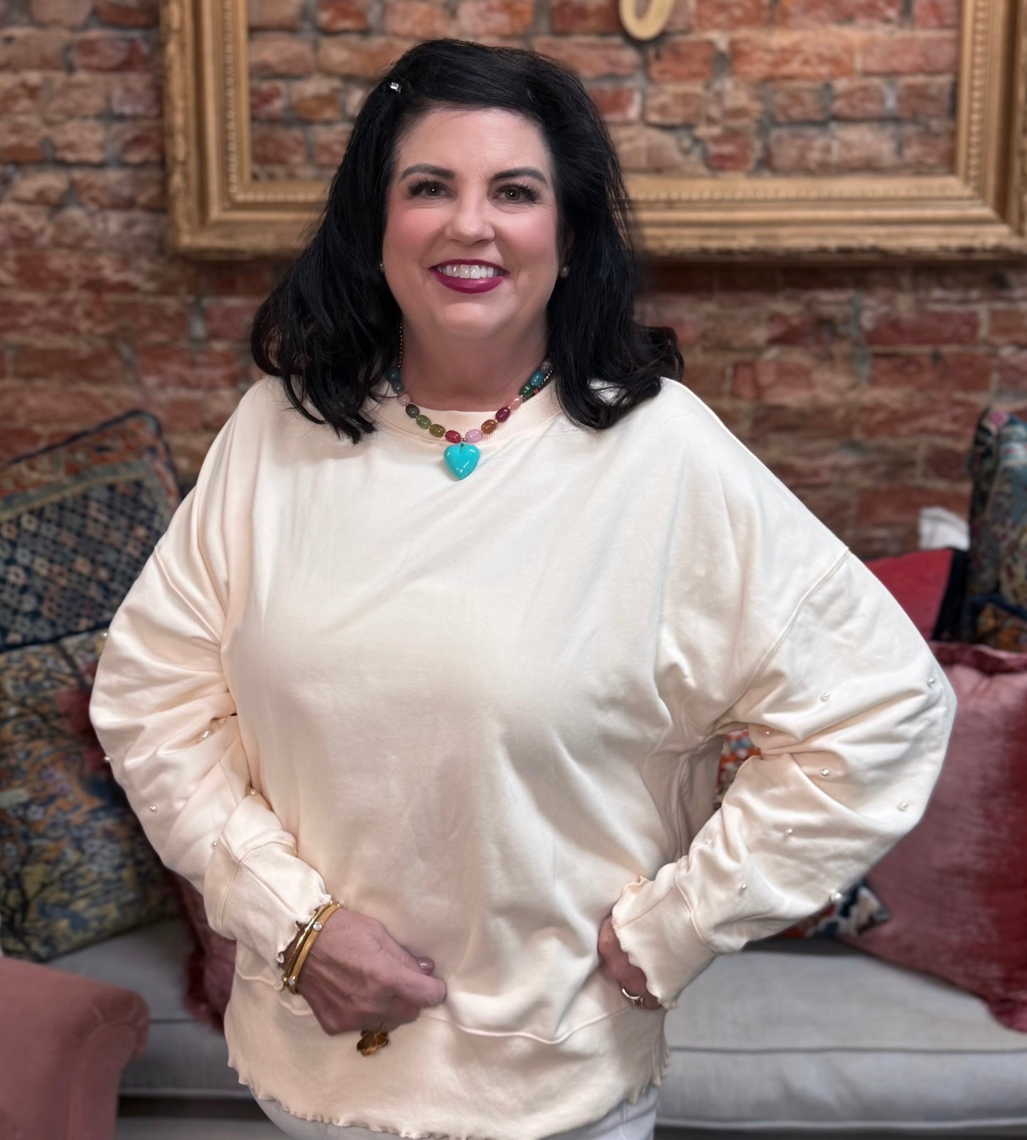 Pearl Studded Long Sleeve Terry Top in cream with pearl-adorned sleeves; available in sizes XS–XL.