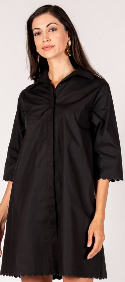 This black Poplin button up dress features a unique scalloped him on the bottom, as well as the sleeves. The fabric makes it comfortable for all day, where it comes in extra small, small, medium and large.