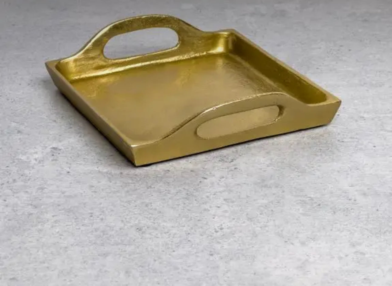 The Rough Gold Serving Tray: small, square, raised edges, cut-out handles. Available sizes: small.