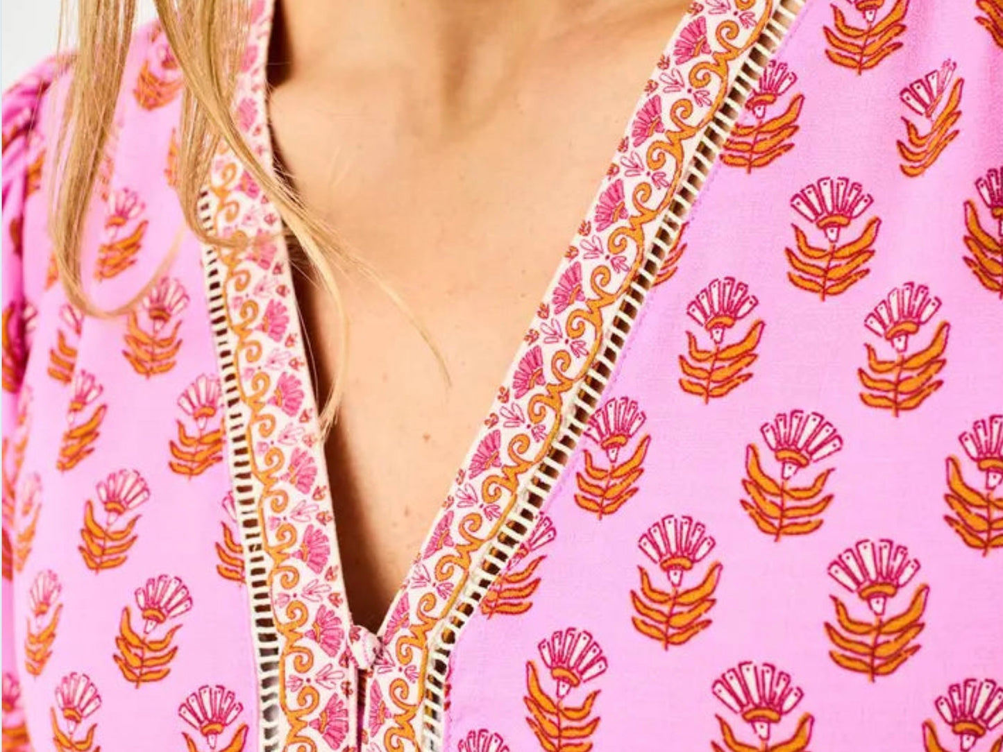 Monroe Floral Foulard Top with pink and orange print, peplum silhouette; available in sizes XS–XL.