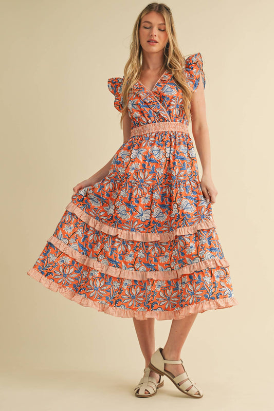 Mixed Floral Print Ruffle Trim Midi Dress with smocked elastic waistband. Available in sizes XS-XL.