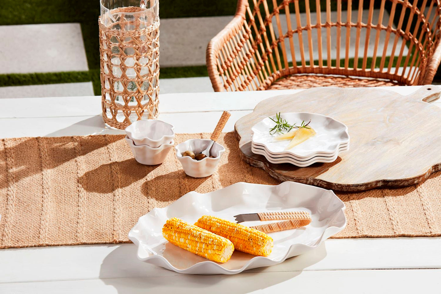 A Ruffled Melamine Platter displaying corn on the cob, designed for outdoor use and is shatterproof. Available in sizes: Small, Medium, Large.