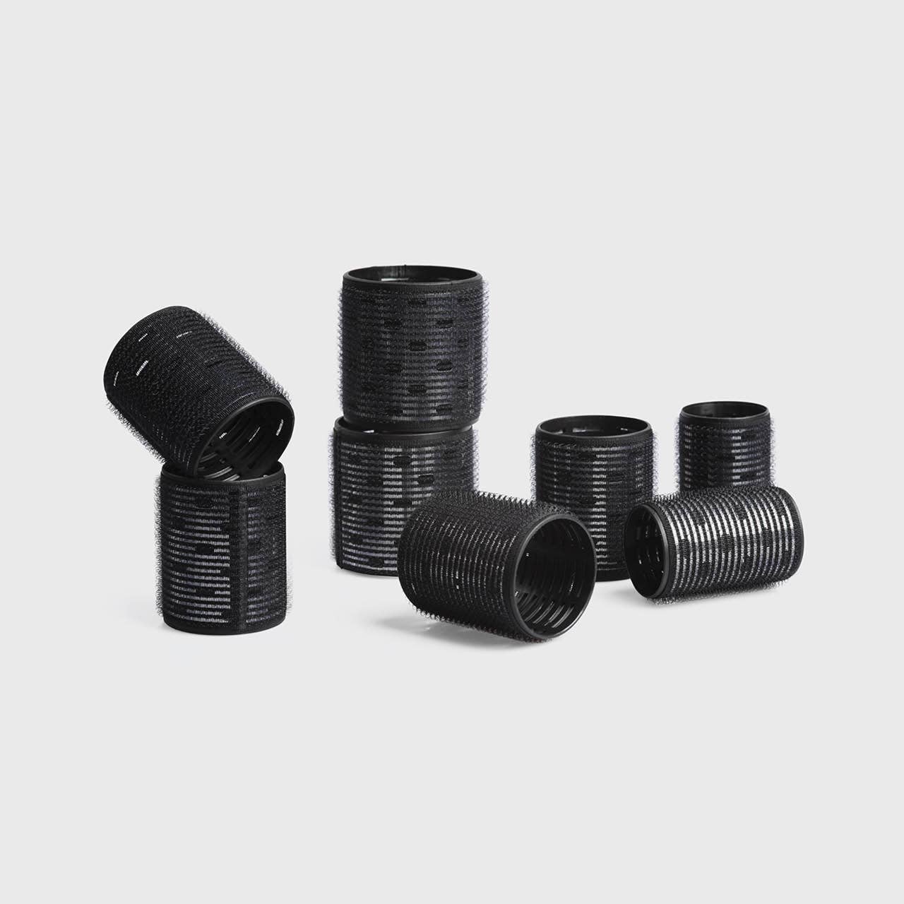 Eight black ceramic thermal rollers in assorted sizes from the Ceramic Hair Roller 8pc Variety Pack.