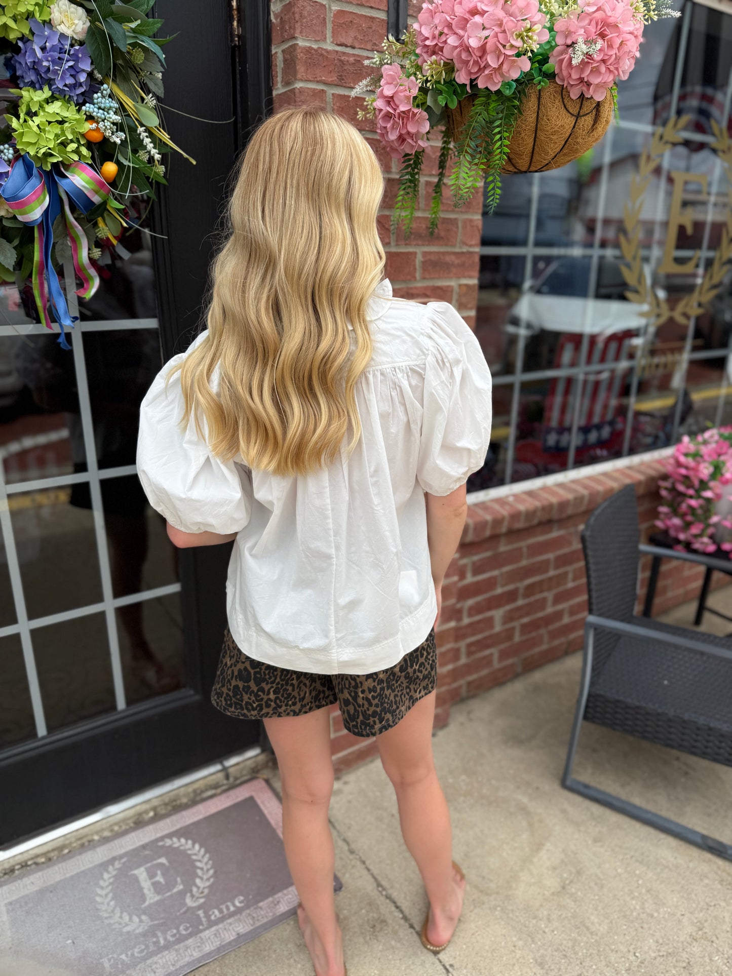 Ruffled V-Neck Puff Sleeve Blouse, available in sizes XS-XL.