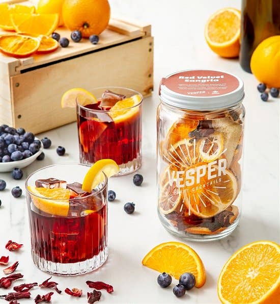32 oz Craft Cocktail Kit for Red Velvet Sangria; includes two glasses with ice and orange garnish.