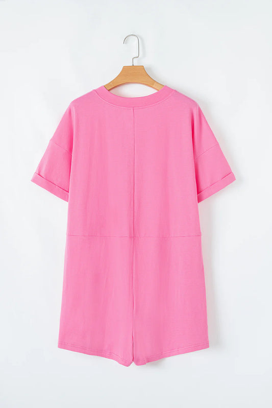 Pink loose half sleeve V-neck knit romper with stretchy fabric, visible seam at waist and back. Sizes available: S, M, L.