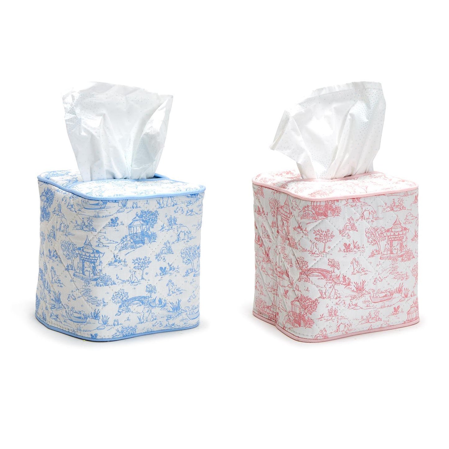 Two cube-shaped tissue box covers: one in blue toile pattern, the other in red animal toile quilted design, both depicting countryside scenes. Sizes: Standard cube size.