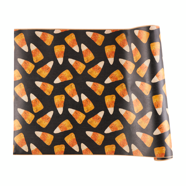 Candy Corn Table Runner Roll with repeating candy corn pattern. Available in multiple sizes. Partially rolled for easy use.