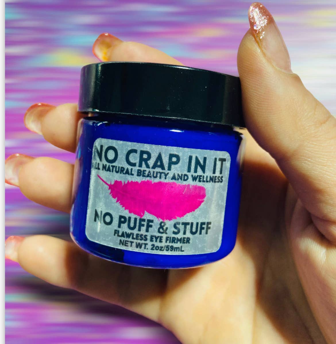 Blue jar labeled "No Puff and Stuff 10ml," an under eye cream for wrinkles and puffiness. Available in 10ml size.