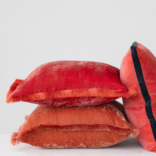 Red eyelash fringe pillow, available in 20" square size, features bold textured detailing.
