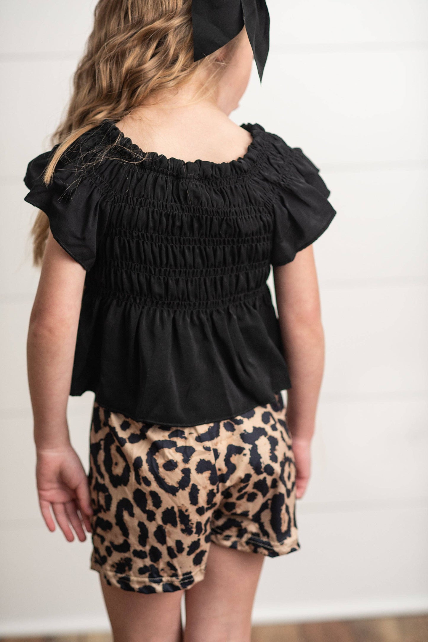 Girls Leopard Shirred Short Set: black ruched top and tan leopard shorts. Available in sizes 4-14.