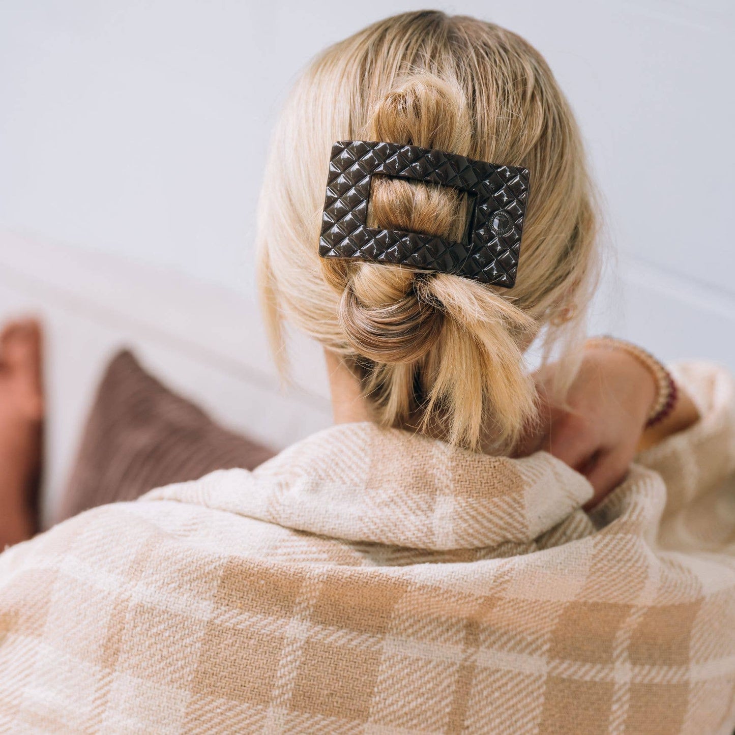 TELETIES Flat Rectangle Hair Clip secures a low twisted hairstyle. Available in small, medium, and large sizes.