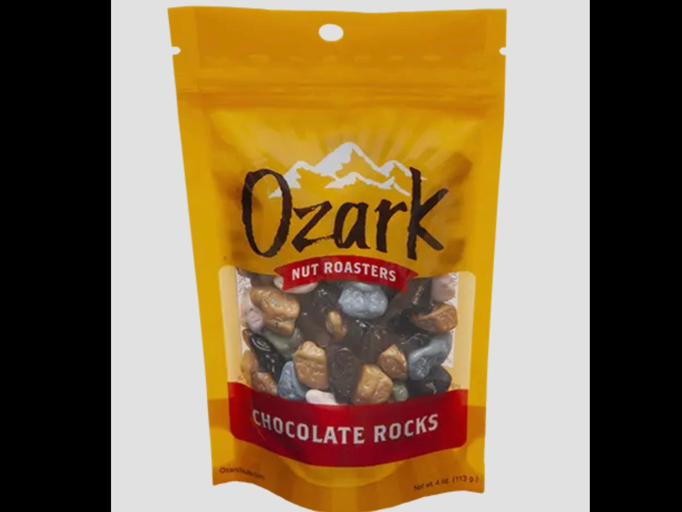 4oz resealable yellow and red Ozark Nut Roasters "Chocolate Rocks" bag with colorful rock-shaped chocolate candy.