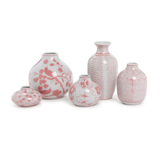 Set of five hand-painted Pink Chinoiserie Vases with intricate red and white patterns. Designs feature floral, botanical, and abstract motifs. Crafted from premium stoneware. Sizes vary from short and round to tall and slender.