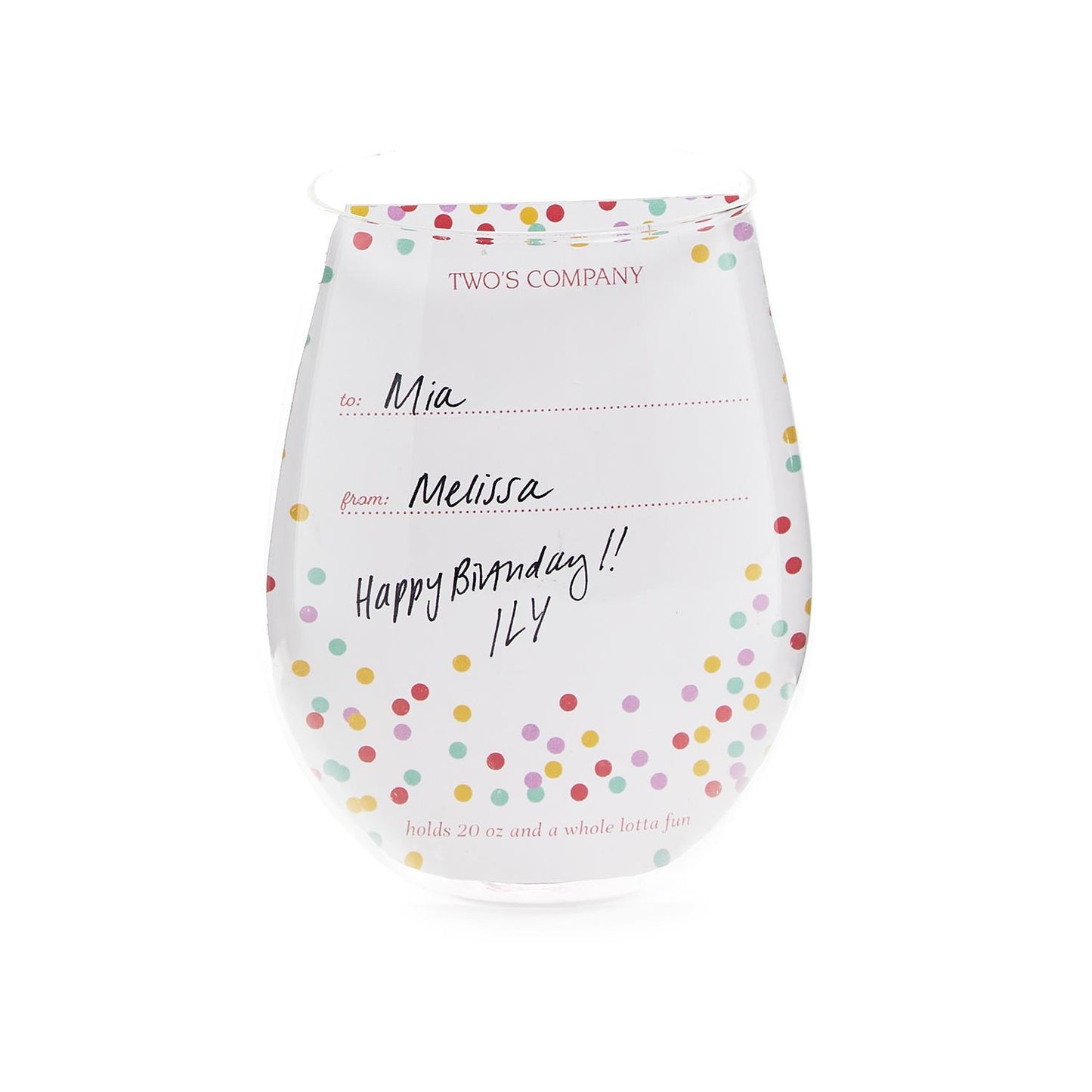 The Celebration Cake Stemless Wine Glass holds 20 oz and features colorful polka dots. The durable glass has a "to" and "from" section filled out with "Mia" and "Melissa," handwritten text saying, "Happy Birthday!! ILY," and printed text at the bottom that reads, "holds 20 oz and a whole lotta fun.