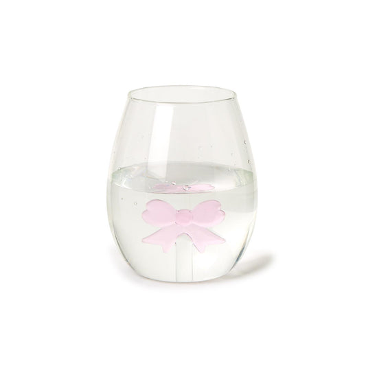The Bow Stemless Wine Glass, highlighted by a pink bow-shaped ice cube, offers elegance and sophistication. Available sizes: 12 oz, 16 oz.