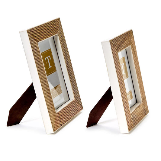 Striated Textured Frames are made from mango wood with a striated texture and white borders. They include brown stands. Sizes available: 4x6, 5x7, 8x10 inches.