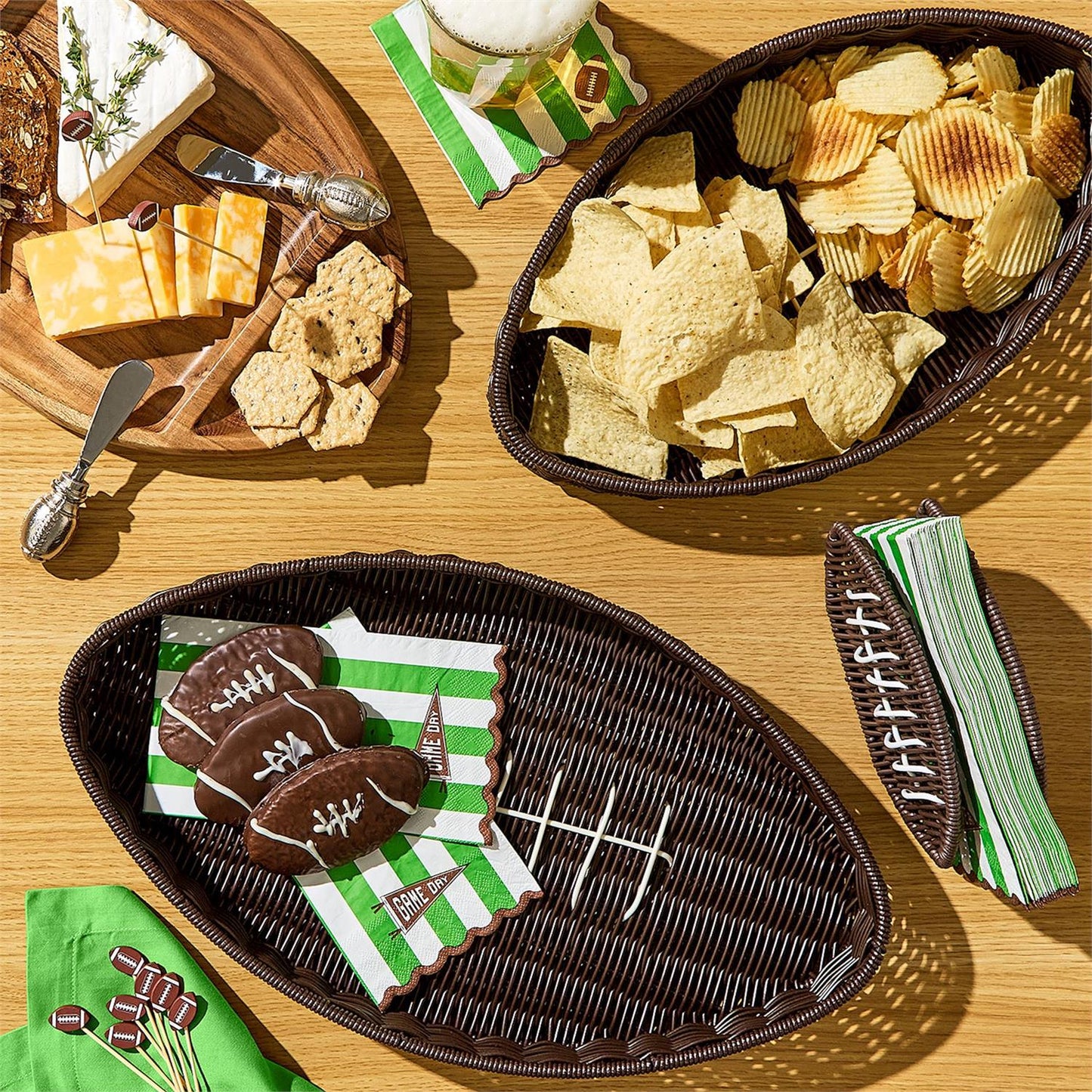 Game Day Football Napkin Holder with neatly arranged football-themed napkins; available in standard size.