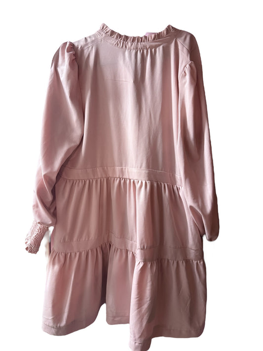 Salmon Tiered Dress in light pink with tiers, long sleeves, ruffled cuffs and hem. Available in sizes XS-XL.