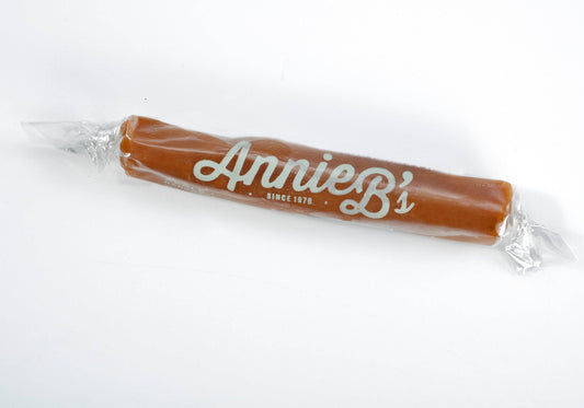 Handmade Caramels stick, wrapped and labeled in white lettering. Available sizes: single stick, 3-pack, 6-pack.