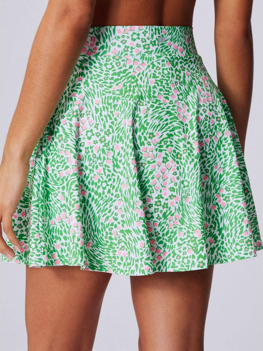 Green Floral Print Skort with pockets, back view. Available in sizes XS–XL.