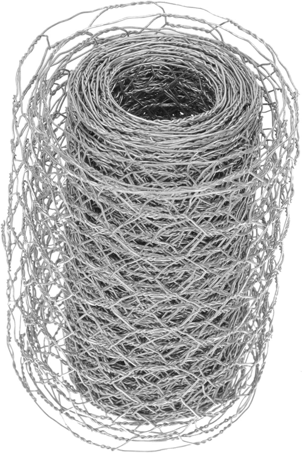 A roll of rustic, rusted chicken wire floral craft mesh ribbon, 2-1/4″ wide, tightly wound with uneven mesh edges.