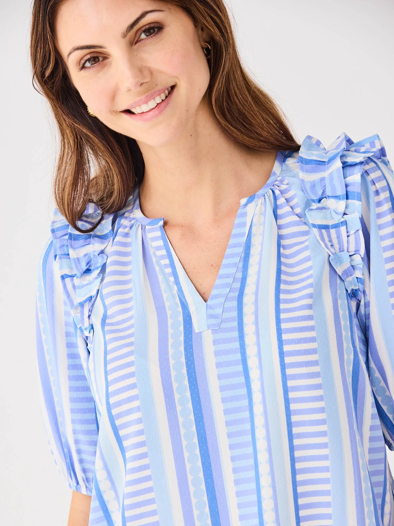 Skylar Simply Striped Blue Top: blue and white puff sleeve blouse with shoulder ruffles, V-neckline. Sizes XS–XL.
