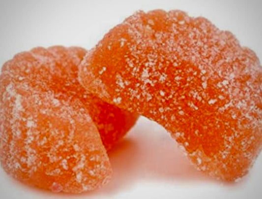 Gourmet Florida Orange Sanded Slices (3/4 Pound): fruit-shaped orange candy slices coated in sugar crystals.