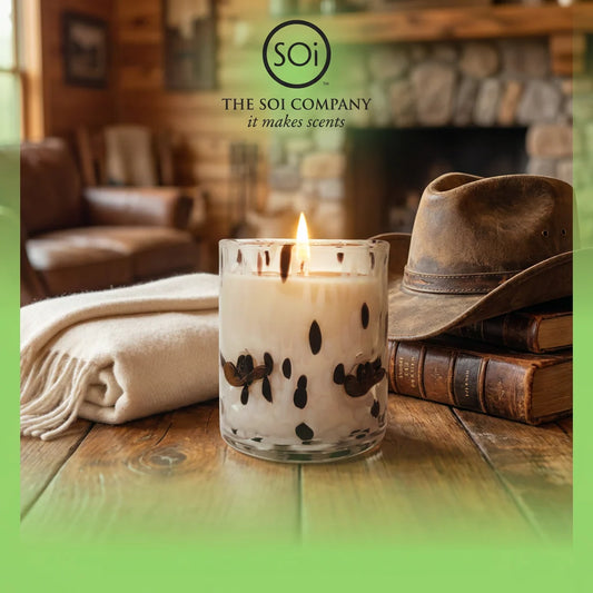 Into the Sunset Soy Candle by SOi Company, lit and presented in a glass jar with pure cotton wicks; crafted from soy and vegetable wax. Available in multiple sizes.